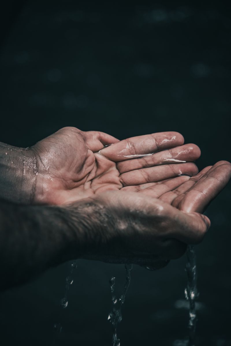 Hands cupping clean water